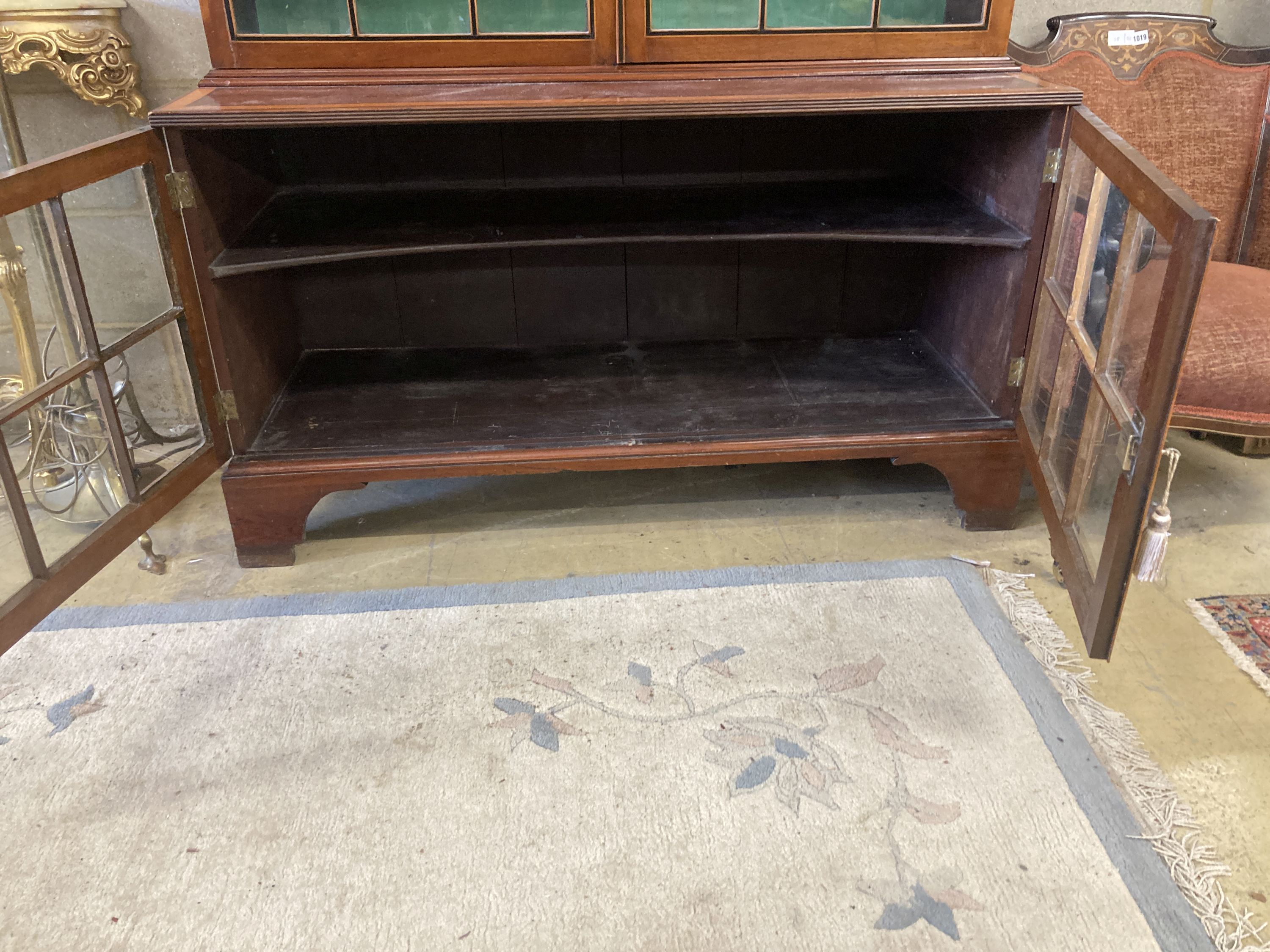 A George III style satinwood and ebony banded mahogany display cabinet, width 132cm, depth 50cm, height 208cm